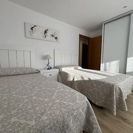 Апартаменты Piso En A 20metros De La Playa De Coroso